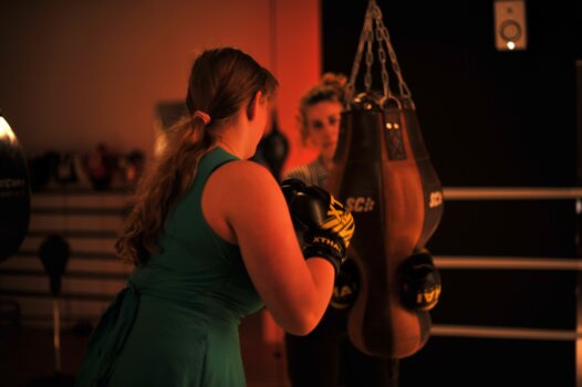 They put on boxing gloves during a live workshop.